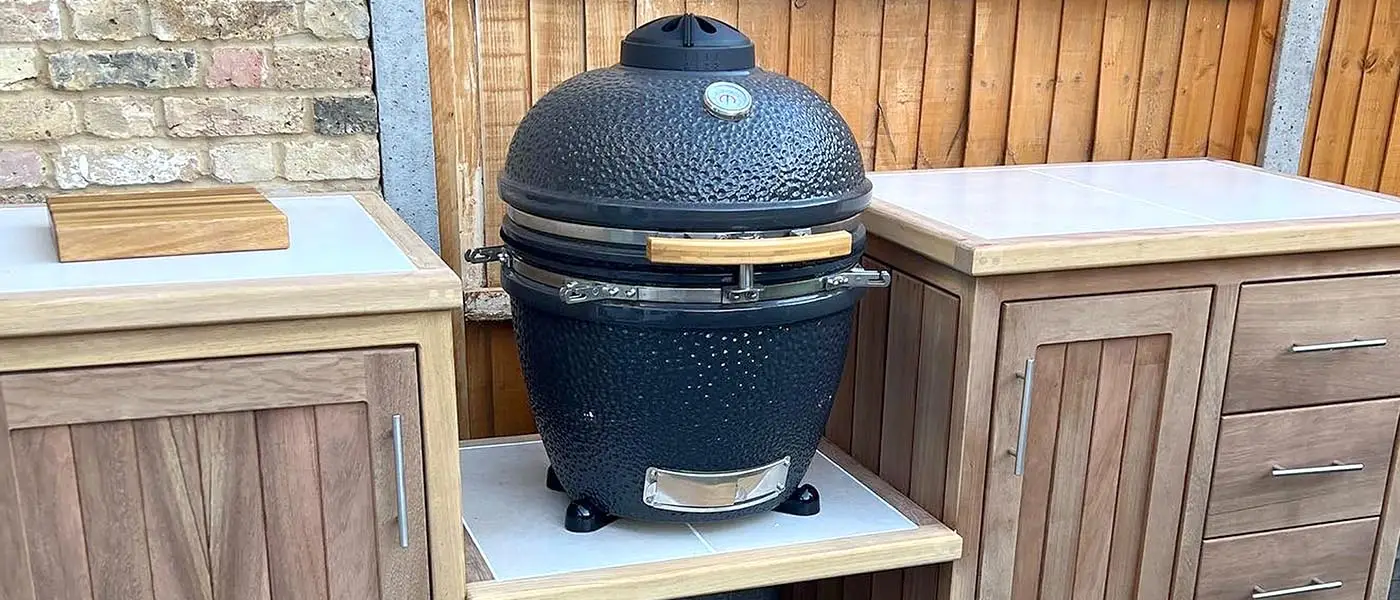 Outdoor kitchen with a Green Egg BBQ station, made by EMH Joinery, Nofolk.