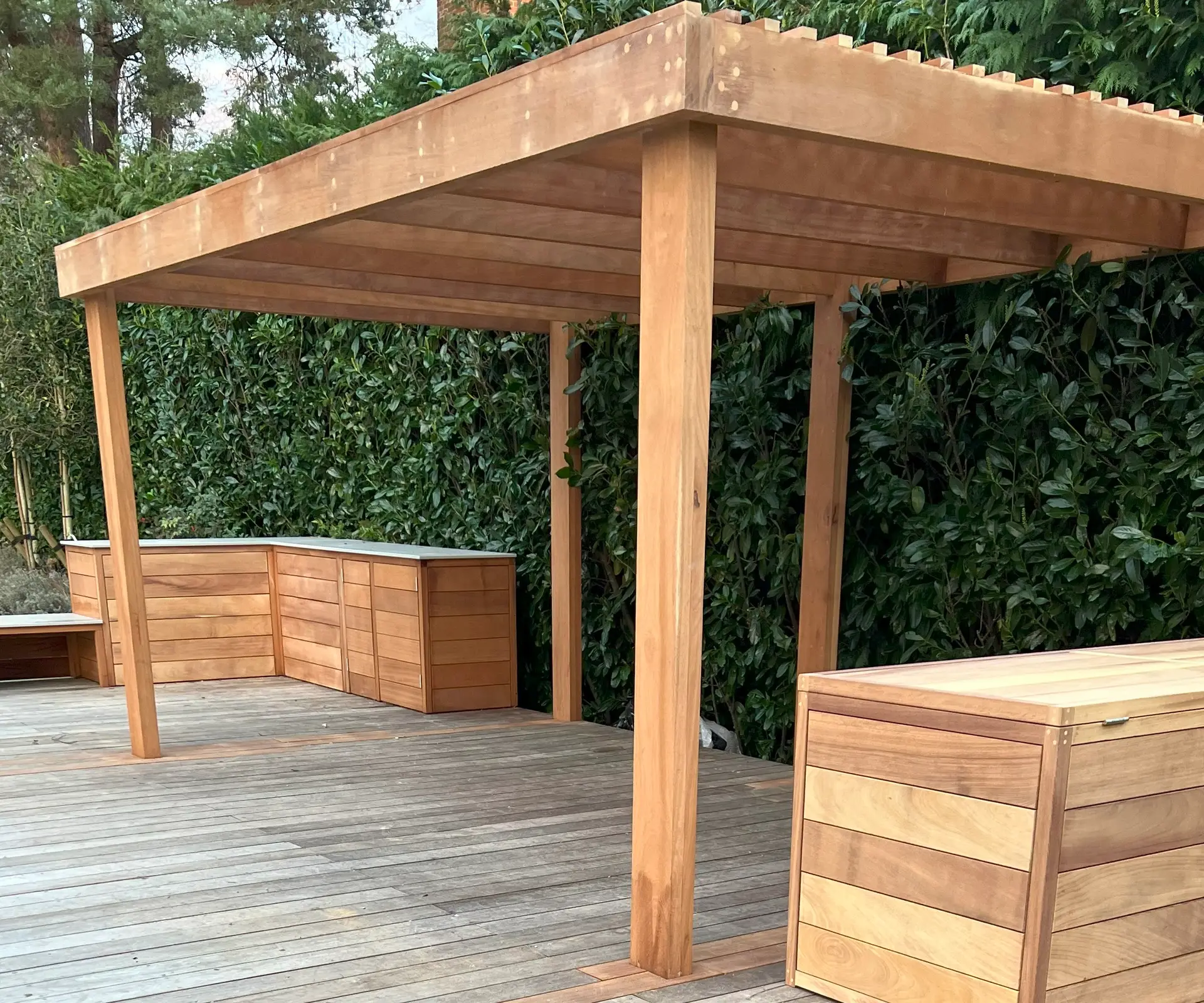 Wooden pergola in a garden in the south east of the UK